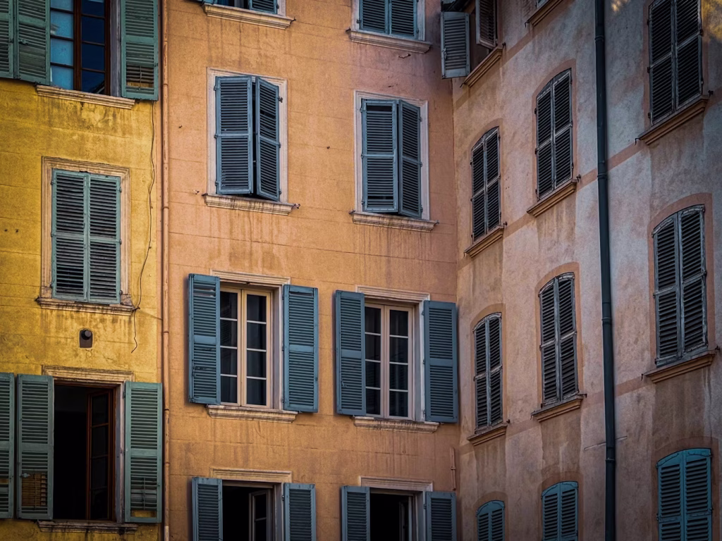 French building with classic shutters